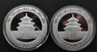 CHINA. TWO 1OZ 999 SILVER 10 YUAN PANDA COINS