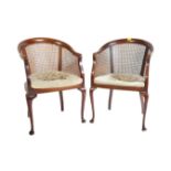 PAIR OF QUEEN ANNE REVIVAL MAHOGANY BERGERE TUB CHAIRS