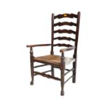 19TH CENTURY NORTH COUNTRY OAK LADDER BACK ELBOW CHAIR