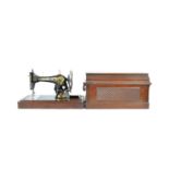 1930S ART DECO OAK SINGER SEWING MACHINE IN CASE