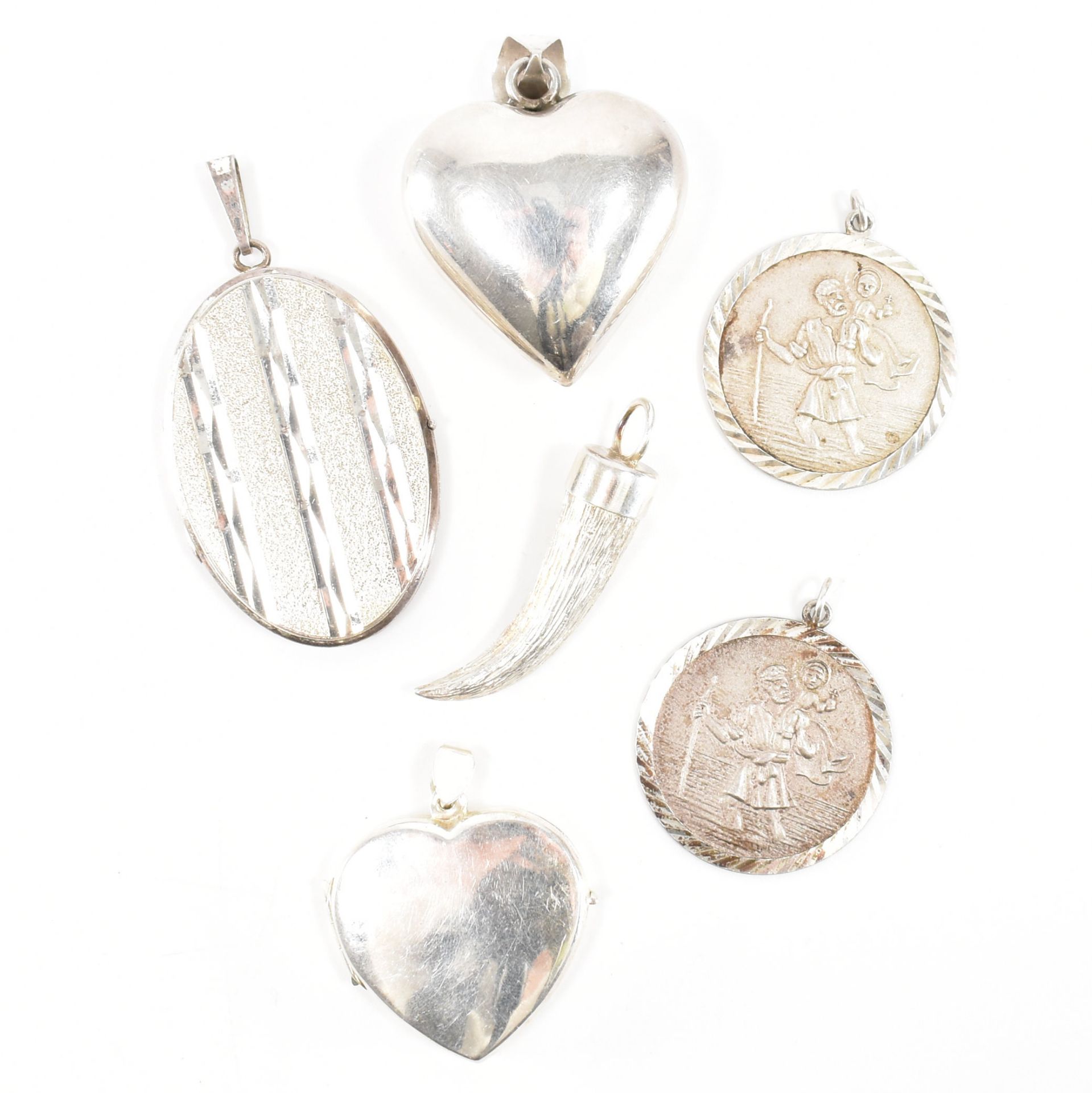 COLLECTION OF ASSORTED SILVER PENDANTS