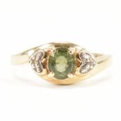 HALLMARKED 9CT GOLD & GREEN STONE CROSSOVER RING