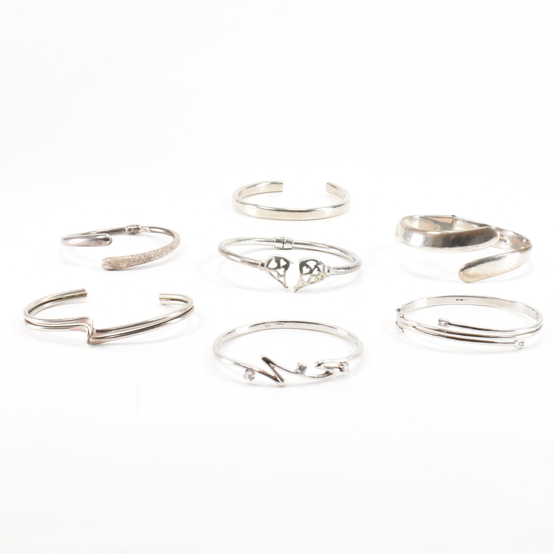 COLLECTION OF ASSORTED 925 SILVER BANGLES