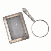 SILVER FRONTED PICTURE FRAME TOGETHER WITH A SILVER HANDLED LOOKING GLASS