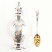A GEORGE III SILVER BERRY SPOON TOGETHER WITH A GEORGE V SILVER CRUET