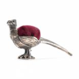 A STERLING SILVER & VELVET PHEASANT PIN CUSHION