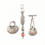 A COLLECTION OF SILVER CHINESE OBJECTS INCLUDING A BABY CHARM