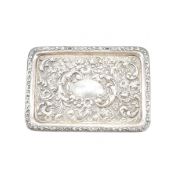 AN EDWARDIAN SILVER DRESSING TABLE TRAY