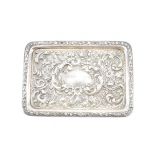 AN EDWARDIAN SILVER DRESSING TABLE TRAY