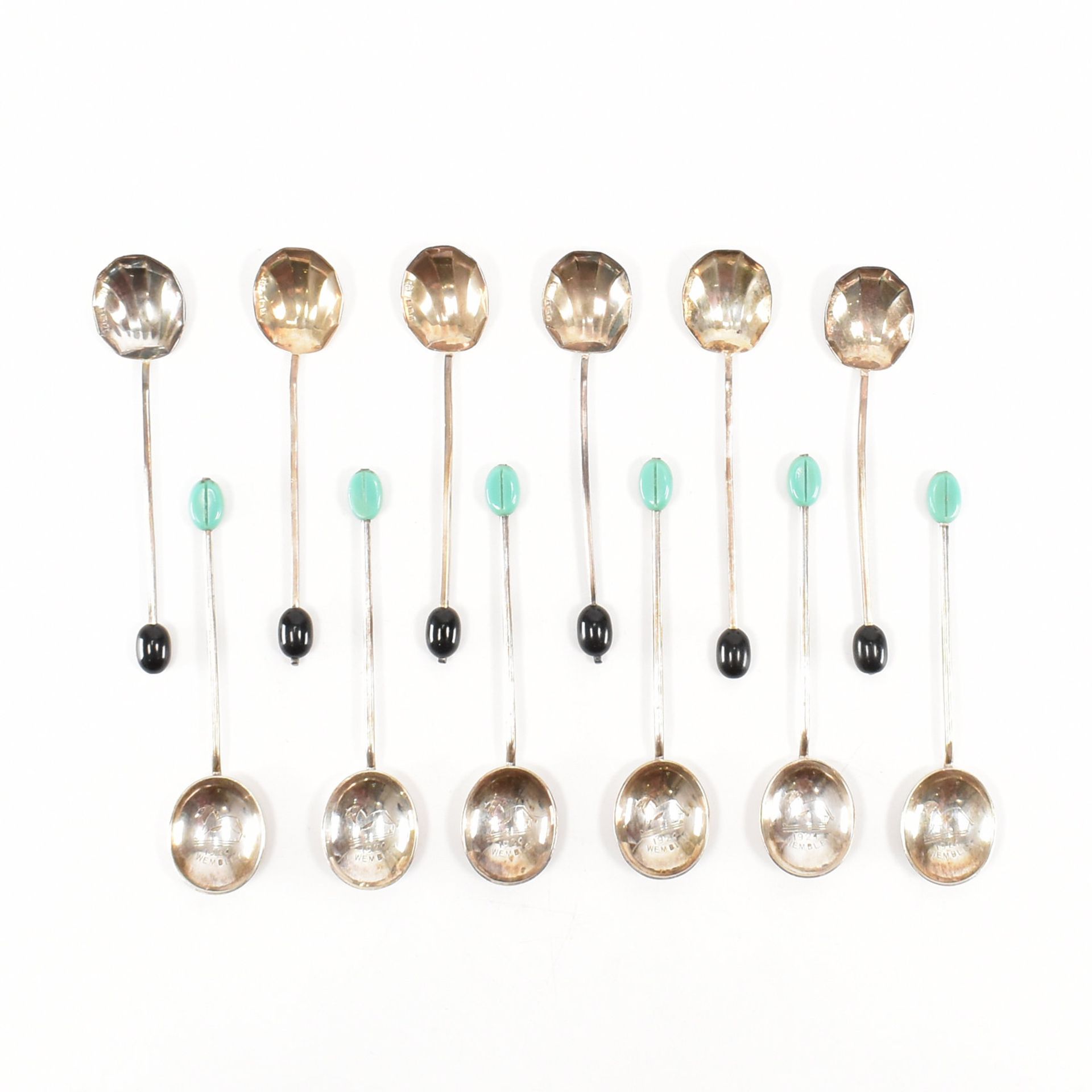 TWO SETS OF TEASPOONS