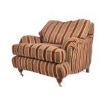 MANNER OF HOWARD & SONS ARMCHAIR