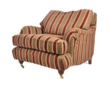 MANNER OF HOWARD & SONS ARMCHAIR