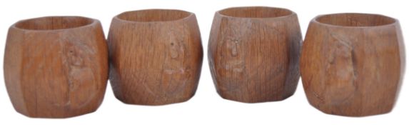 SET OF FOUR ROBERT MOUSEMAN NAPKIN RINGS