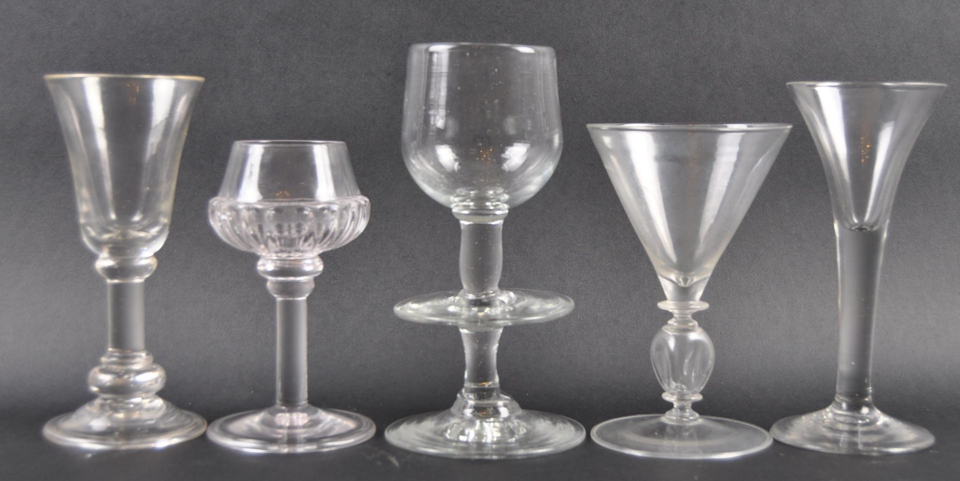 GROUP OF FIVE WINE DRINKING GLASSES