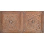 PAIR OF 19TH CENTURY CARVED OAK GEOMETRIC PANELS