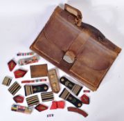 LEATHER SATCHEL, EPAULETTES & ADDRESS PLATE OF F. O. MIKSCHE
