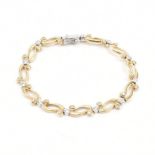 HALLMARKED TWO TONE 9CT GOLD & WHITE STONE BRACELET