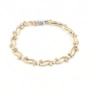 HALLMARKED TWO TONE 9CT GOLD & WHITE STONE BRACELET