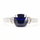 HALLMARKED 9CT WHITE GOLD SYNTHETIC SAPPHIRE & CZ RING