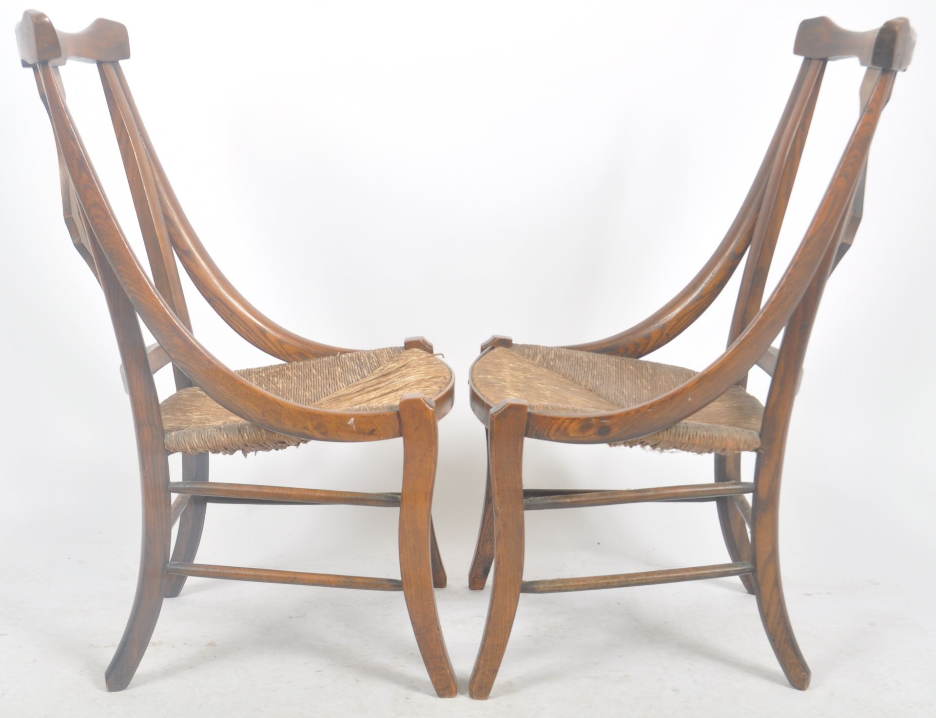 MATCHING PAIR OF ARTS & CRAFTS OAK AND RUSH SEAT CHAIRS - Image 4 of 6