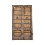 PAIR OF 20TH CENTURY DECORATIVE OAK AND IRON DOORS