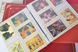 EXTENSIVE COLLECTION OF STAMP POSTCARD ALBUMS