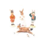 COLLECTION OF FOUR FIGURES - DOULTON BUNNYKINS & BESWICK