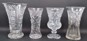 FOUR 20TH CENTURY LARGE CUT GLASS VASES
