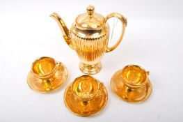 20TH CENTURY ROYAL WINTON CHINA GILT COFFEE SET