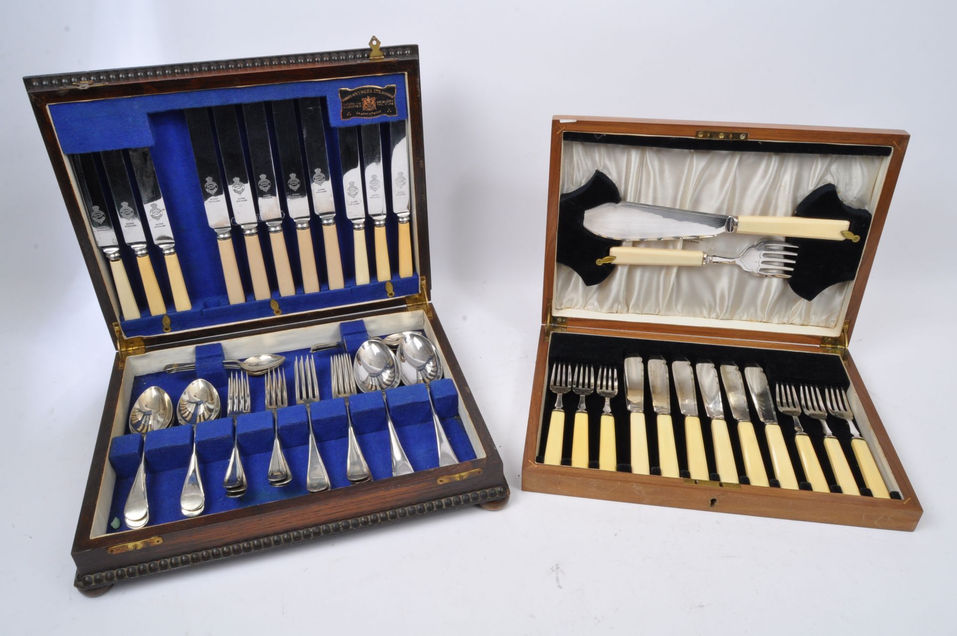 TWO VINTAGE ENGLISH WOODEN CASED CANTEENS OF CUTLERY