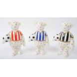 ROYAL CROWN DERBY - COLLECTION OF THREE FOOTBALL MINI BEAR