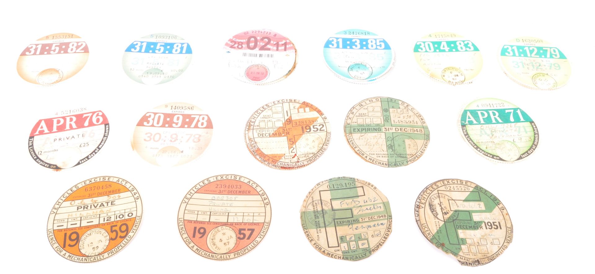 COLLECTION OF THIRTY-SIX VINTAGE TAX DISCS