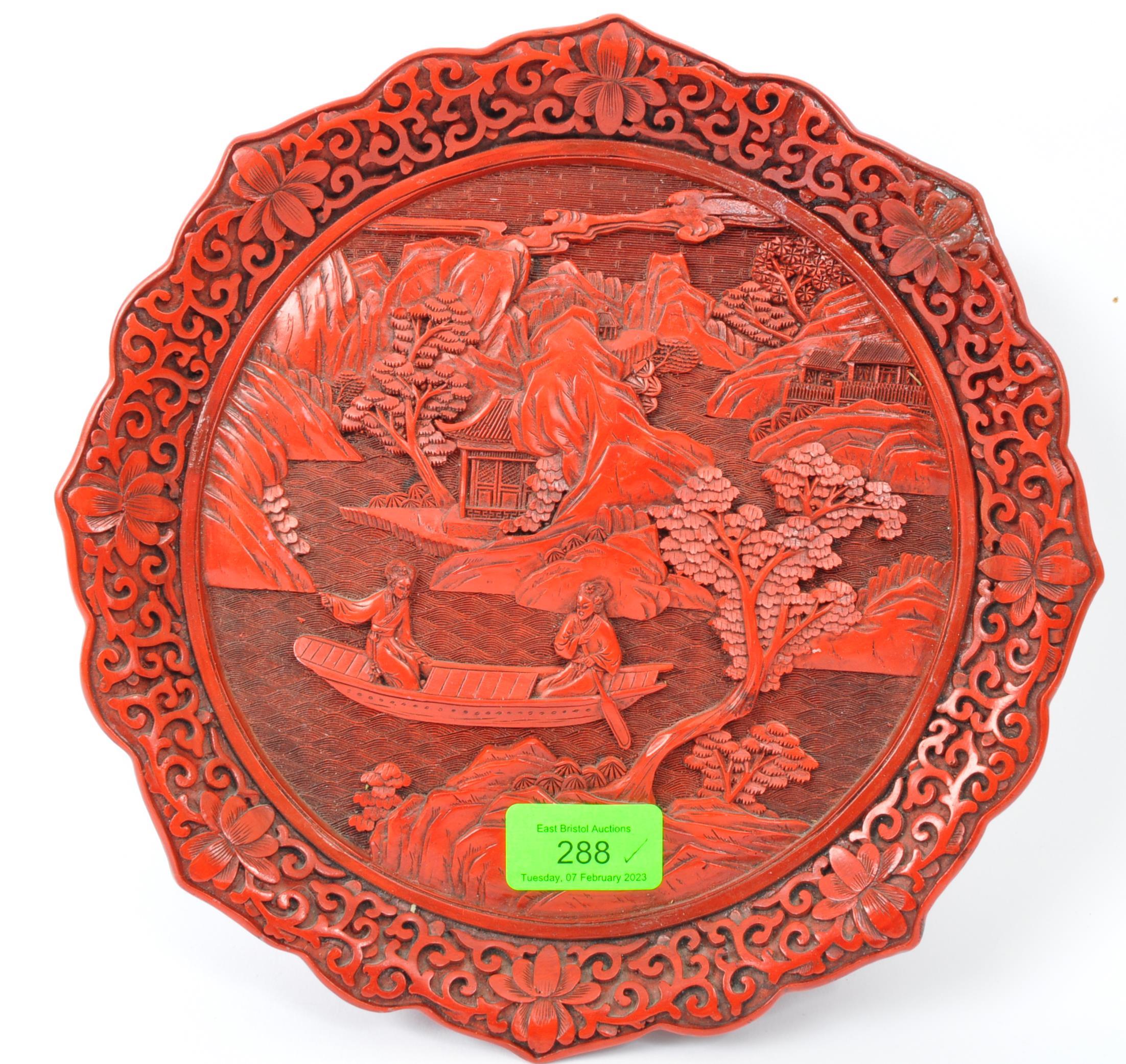 EARLY 20TH CENTURY CHINESE CARVED CINNABAR PLATE