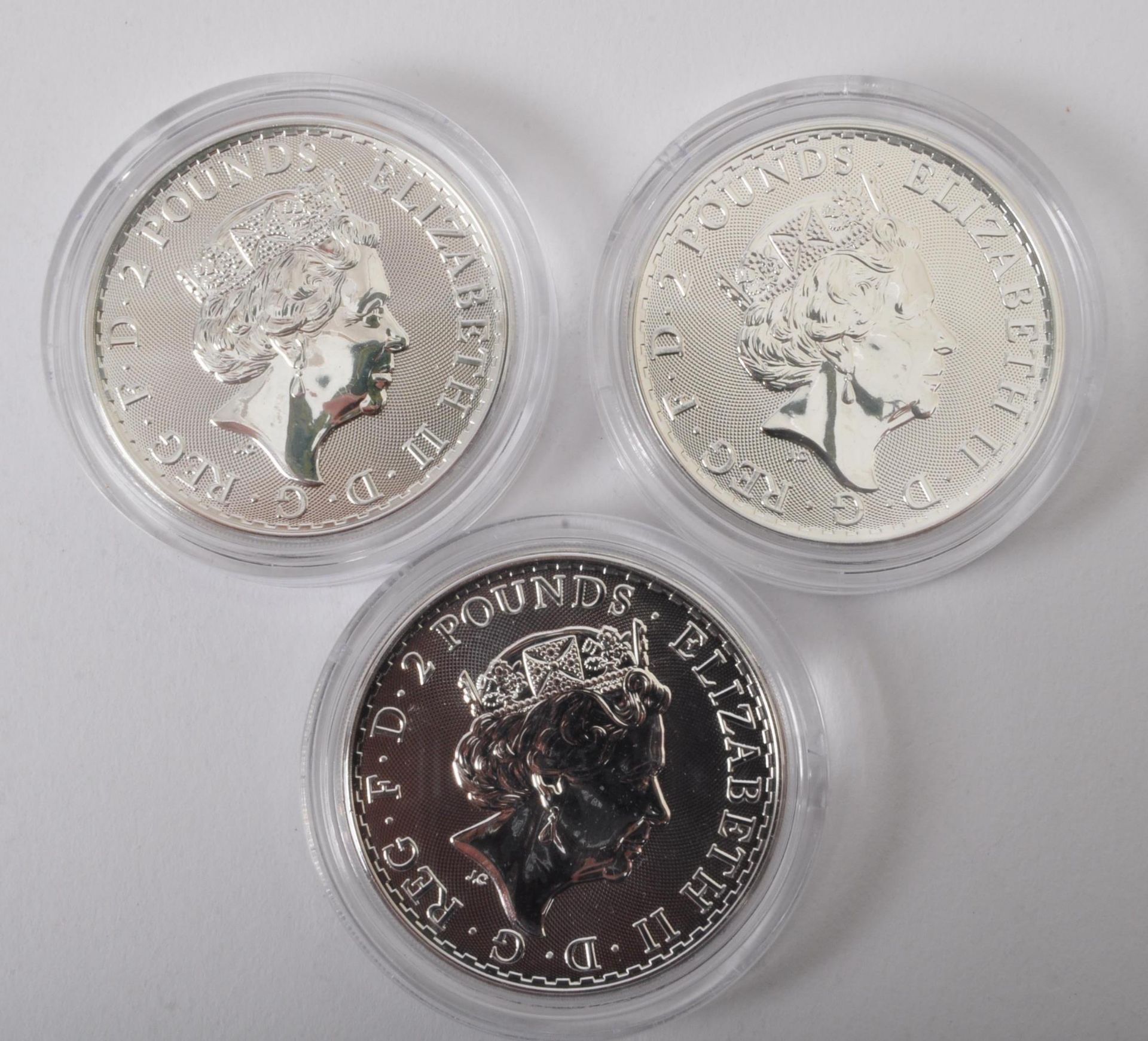 THREE UK QUEEN ELIZABETH II 1OZ 999 SILVER BRITANNIA £2 COINS