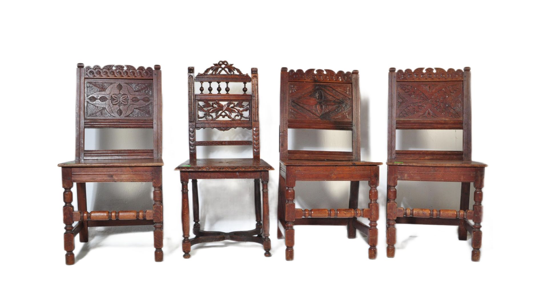 THREE CAROLEAN REVIVAL OAK CARVED DINING CHAIRS T/W ANOTHER