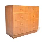 MEREDEW - MID CENTURY OAK TWO OVER THREE CHEST OF DRAWERS