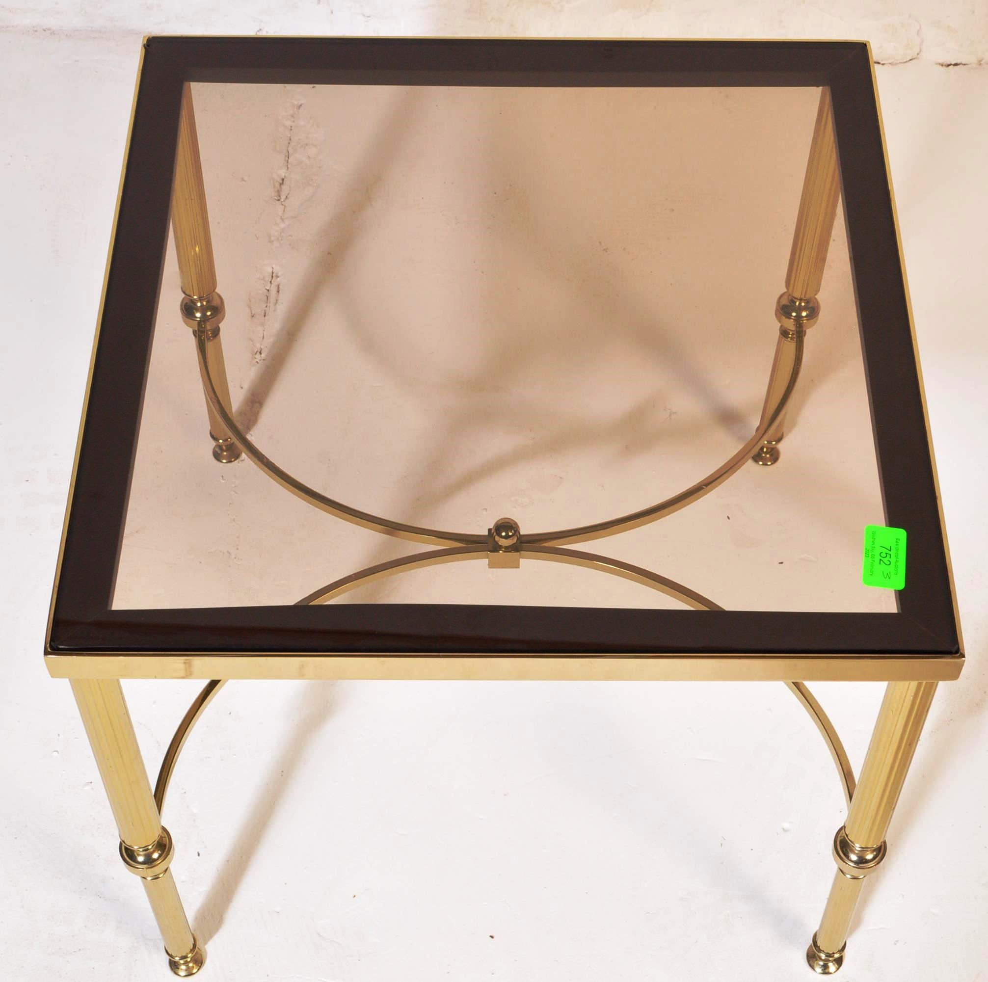 A 20th Century 1980s Hollywood Regency brass framed coffee table / low table of square form having - Image 4 of 5