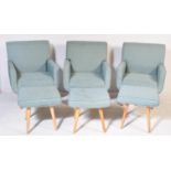 THREE CONTEMPORARY LIGHT BLUE LOUNGE CHAIRS WITH STOOLS