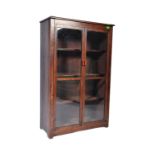 20TH CENTURY OAK TWIN DOOR GLAZED BOOKCASE CABINET