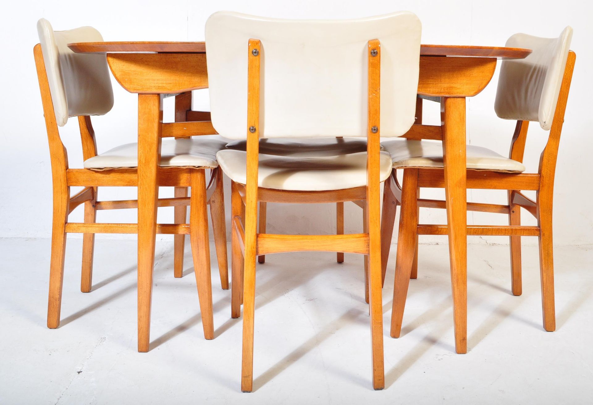 MID 20TH CENTURY TEAK EXTENDING DINING TABLE W/ CHAIRS