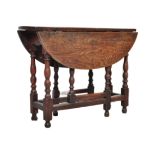 19TH CENTURY OAK DROP LEAF DINING GATELEG TABLE