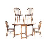 SET OF FOUR MID CENTURY OAK AND ELM WOOD DINING CHAIRS