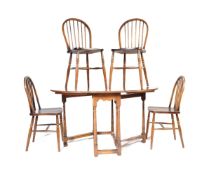 SET OF FOUR MID CENTURY OAK AND ELM WOOD DINING CHAIRS