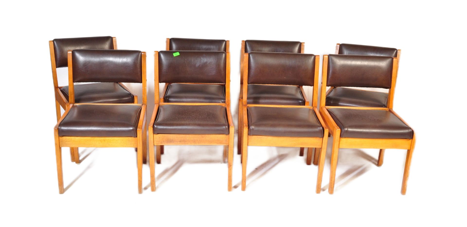 EIGHT RETRO MID 20TH CENTURY FAUX LEATHER & TEAK DINING CHAIRS