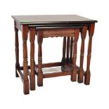 20TH CENTURY JACOBEAN REVIVAL OAK NEST OF GRADUATING TABLES