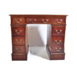 GEORGE III REVIVAL MAHOGANY KNEEHOLE TWIN PEDESTAL DESK