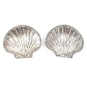 TWO SILVER SCALLOP SHELL SALT DISHES
