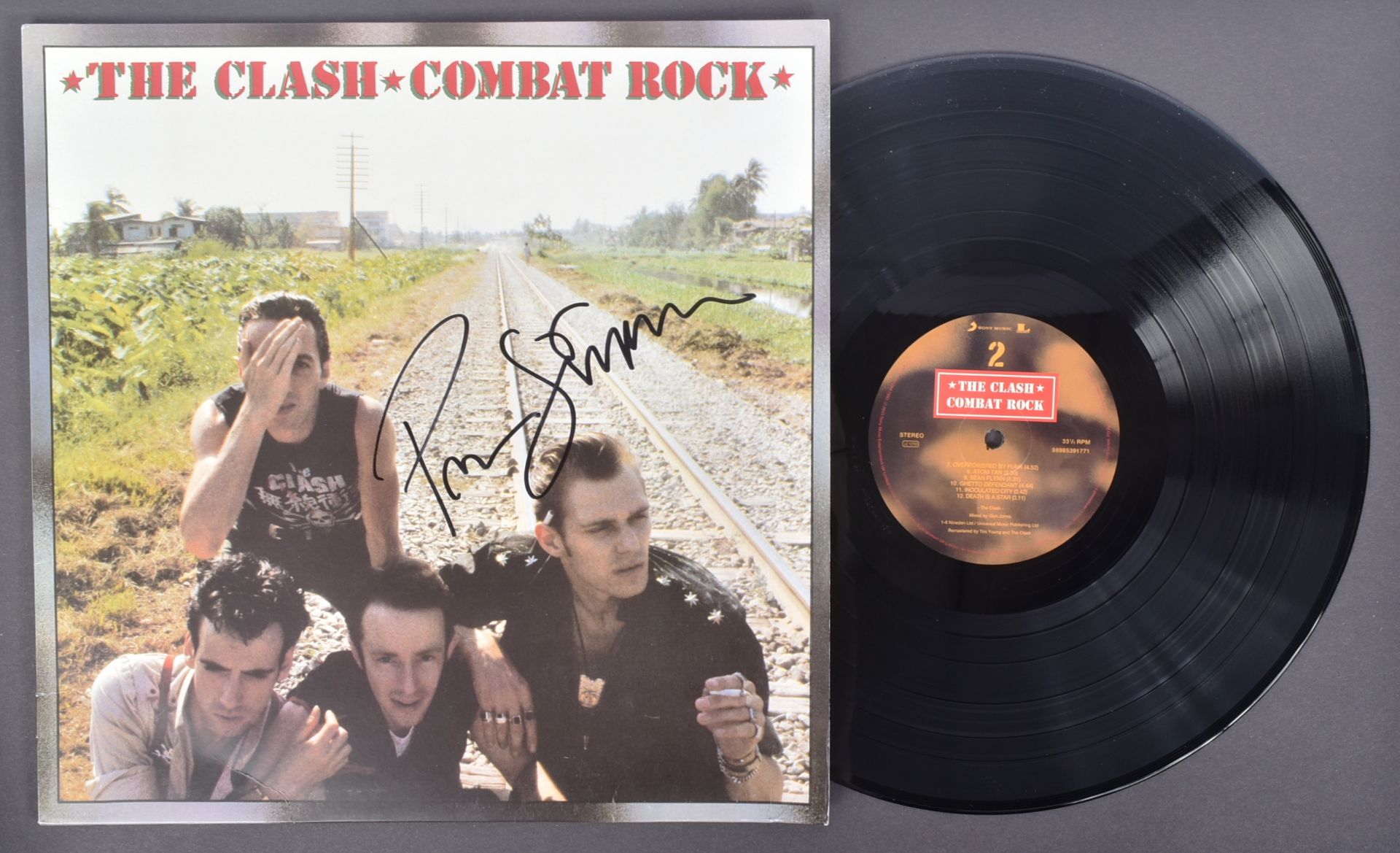 THE CLASH - PAUL SIMONON - AUTOGRAPHED LP - AFTAL