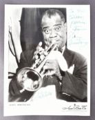LOUIS ARMSTRONG (1901-1971) - 'SATCHMO' - SCARCE AUTOGRAPHED 8X10" PHOTO