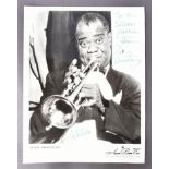 LOUIS ARMSTRONG (1901-1971) - 'SATCHMO' - SCARCE AUTOGRAPHED 8X10" PHOTO